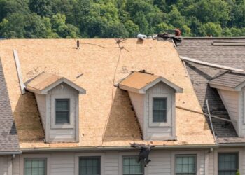Pros and Cons of Re-Roofing vs. Roof Replacement - Roofing Optimum