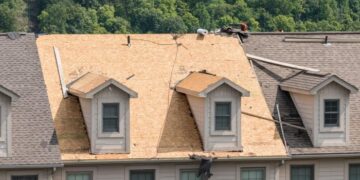 Pros and Cons of Re-Roofing vs. Roof Replacement - Roofing Optimum