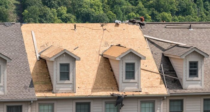 Pros and Cons of Re-Roofing vs. Roof Replacement - Roofing Optimum